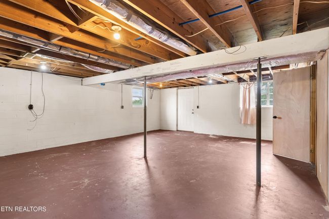 possible 4th bedroom in basement with walkout to back yard. Could be an office or workshop. | Image 22