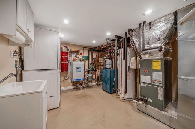 Utilities with water heater and a heating unit | Image 25