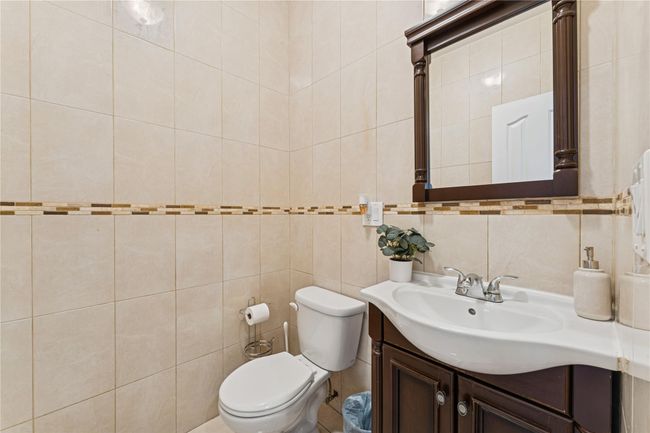 1st floor half bathroom | Image 7