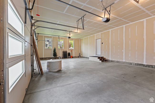 Garage featuring a garage door opener | Image 39