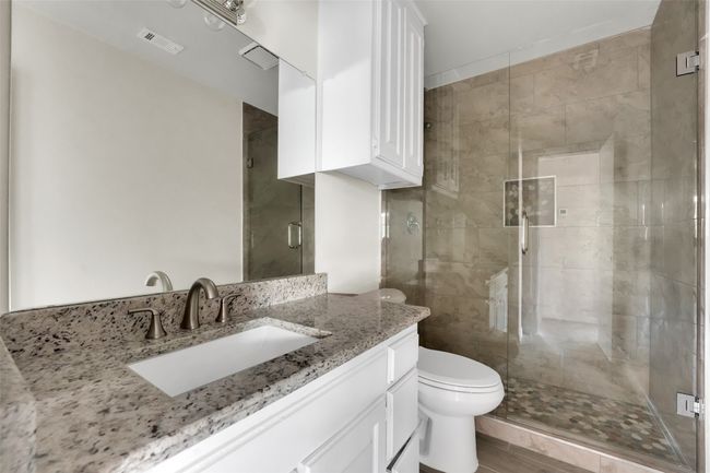 Full bathroom featuring vanity and a stall shower | Image 10