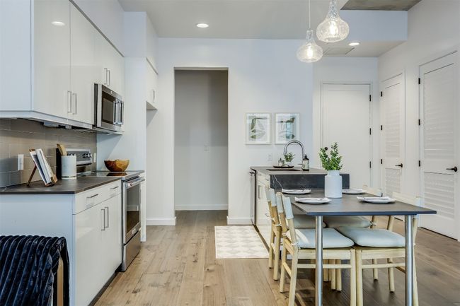 The kitchen feels like a space designed for both function and flow, where every detail is in its place, making cooking or simply hanging out feel effortless | Image 10
