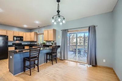 Dining Room With Walkout To 3 Season Porch | Image 3