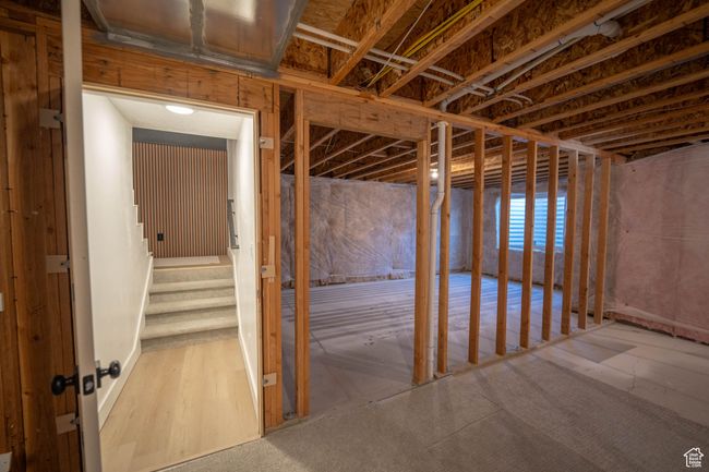This open basement is a blank canvas with the hard work already done—framing, rough wiring, and insulation are complete! Whether you dream of a home theater, gym, or extra bedrooms, it’s ready for your vision. Plus, check out the included Basement vis | Image 31