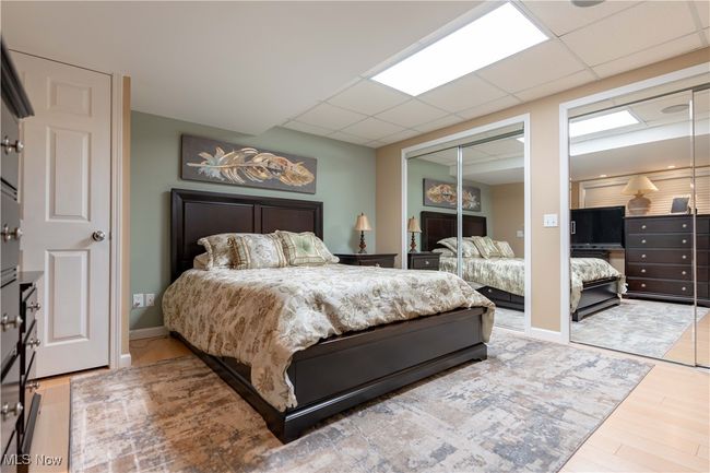 Here is a view of the lower level bedroom. There is a great deal of double closets. This lower level bedroom | Image 35
