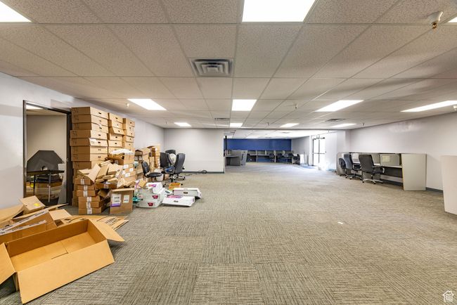 Below grade area featuring carpet flooring and a drop ceiling | Image 24