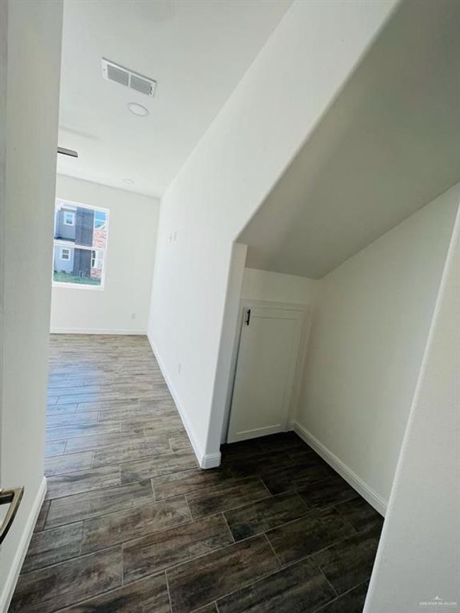 Additional living space with dark hardwood / wood-style floors | Image 19