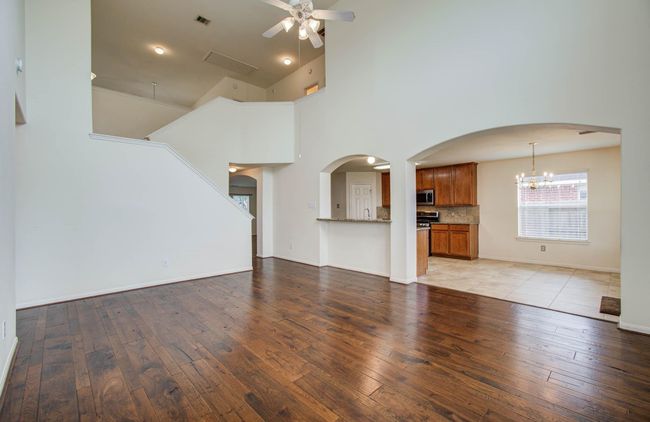 The home features arched entryways throughout. | Image 16
