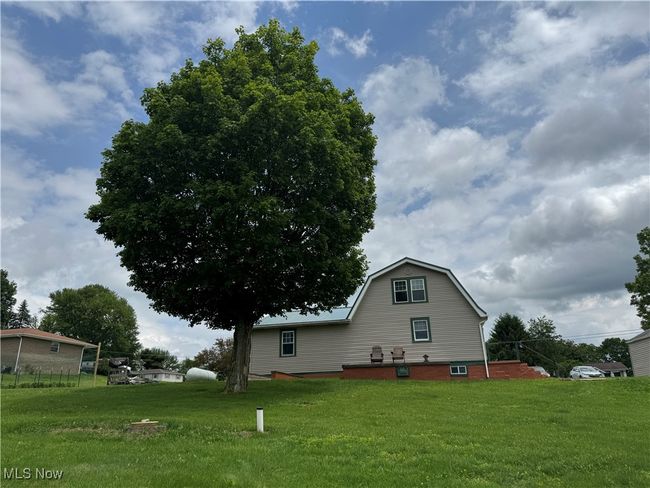View of side of property featuring a yard | Image 4