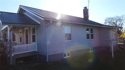 View of side of home featuring a porch | Image 2