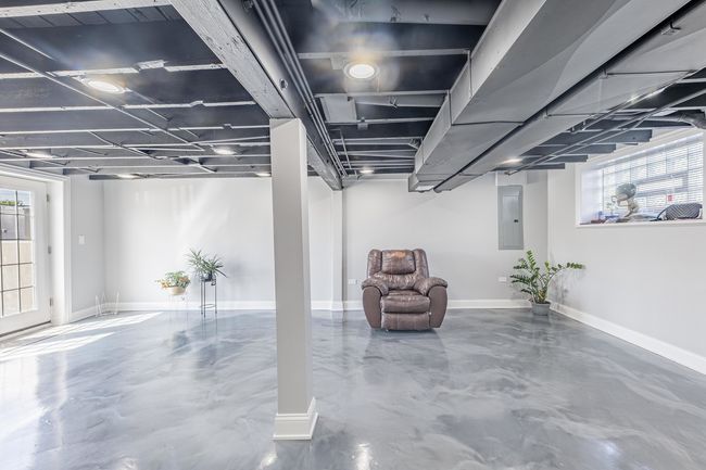 The lavish lower level is a sanctuary of its own. | Image 52
