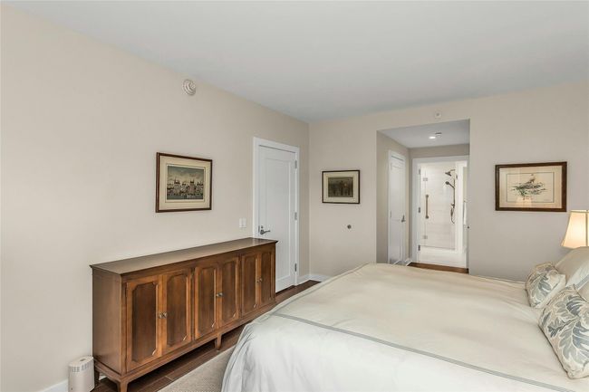 Bedroom with baseboards and connected bathroom | Image 13