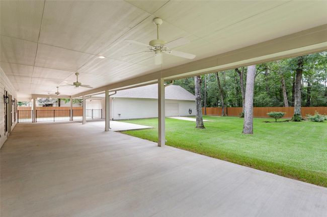 Wow, this is a MUST SEE! 1194 sq ft back porch under roof. | Image 36