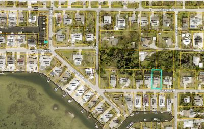 County GIS Aerial Map. Green outlines show deeded boat dock and home locations. | Image 1