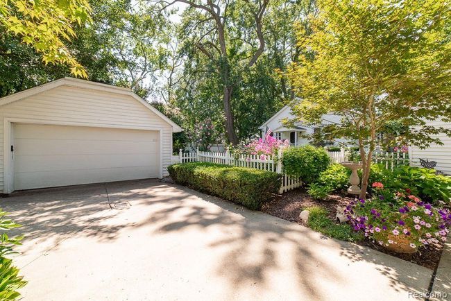Nestled on .38 acre lot w/ English Garden touches | Image 4