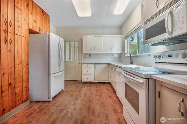 Bright kitchen with vintage cabinetry. | Image 9