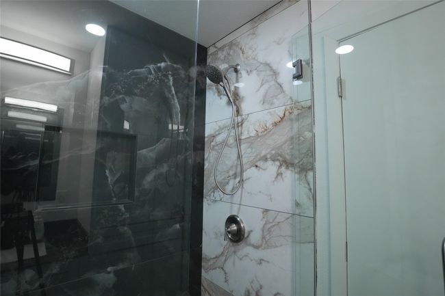 Full bath with a marble finish shower | Image 11