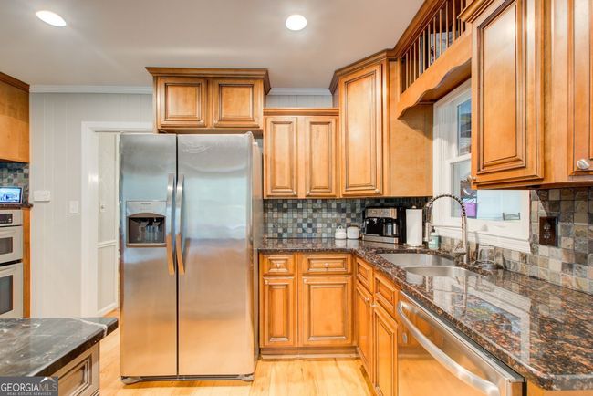7295 Hunters Branch Dr, House other with 4 bedrooms, 3 bathrooms and null parking in Sandy Springs GA | Image 9