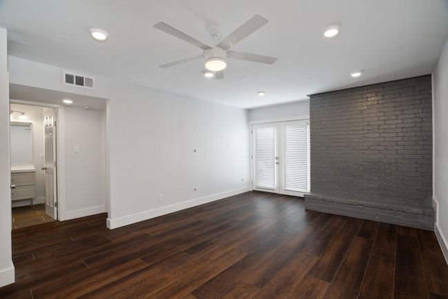 Empty room featuring dark wood-style flooring, a ceiling fan, and recessed​​‌​​​​‌​​‌‌​‌‌​​​‌‌​​‌‌​‌​​​​​‌ lighting | Image 7
