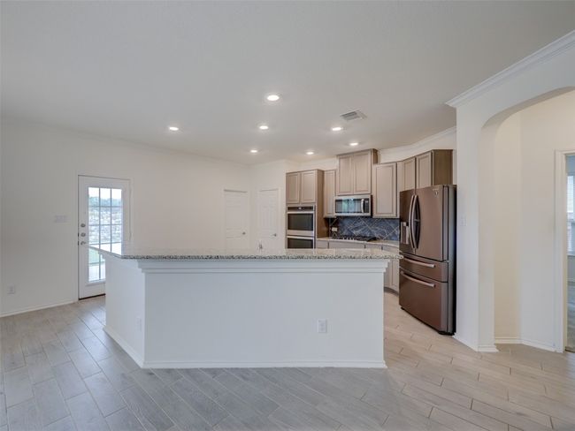 Kitchen island gives you lots of prep room | Image 15