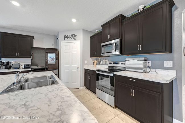 6586 Split Rail Ln, House other with 4 bedrooms, 2 bathrooms and null parking in Cocoa FL | Image 18