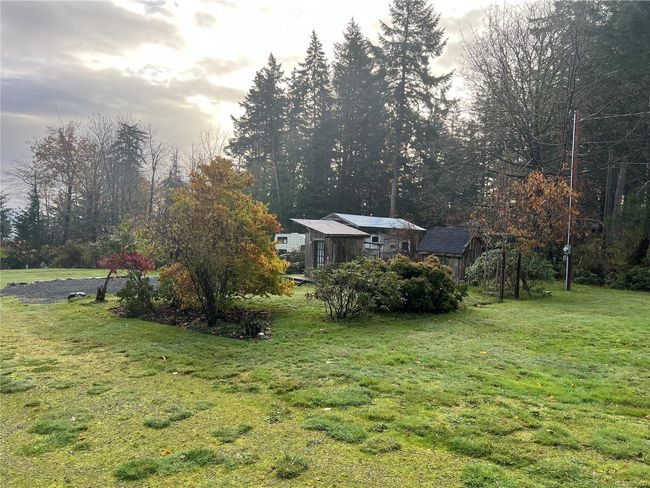 there are 2 sheds in place, one with a washer and dryer inside and the other houses the well & well equipment | Image 10