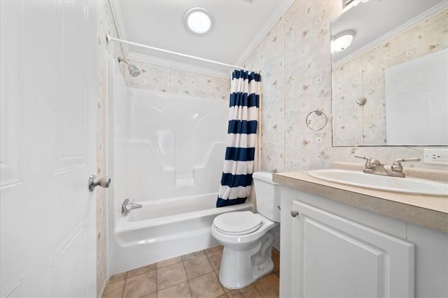 641 Hyacinth Cir, House other with 2 bedrooms, 2 bathrooms and null parking in Barefoot Bay FL | Image 16
