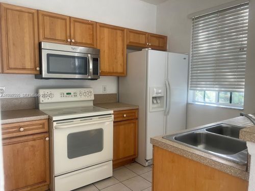 969 Abaco Ln, Riviera Beach, FL, 33404-6444 | Card Image