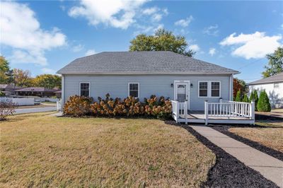 View of front of house with a front lawn and a wooden deck | Image 2