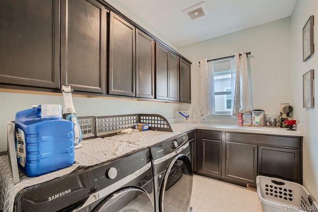 Laundry of garage entrance/stairs to downstairs | Image 7