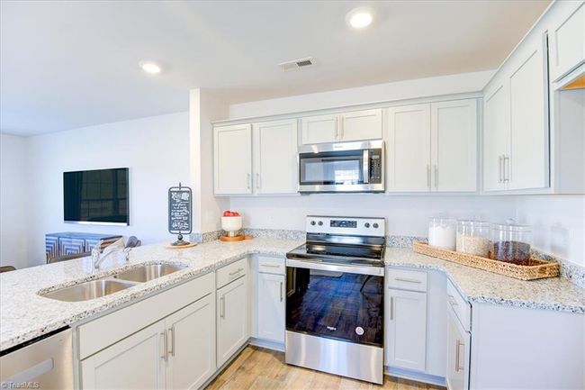 ALL PHOTOS ARE REPRESENTATIVE, NOT OF THE ACTUAL HOME. CABINETS ARE CANE SUGAR IN THE ACTUAL HOME. | Image 12
