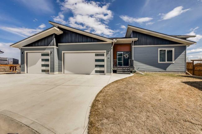 18 Poplar Ridge Close, Home with 4 bedrooms, 3 bathrooms and 5 parking in Didsbury AB | Image 1