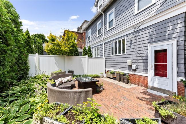 private fenced-in back yard with patio | Image 5