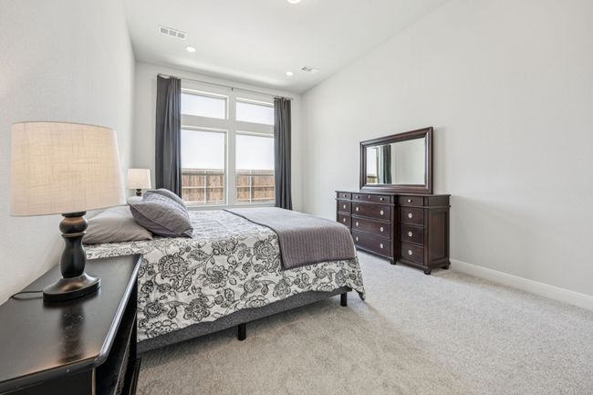 Bedroom with carpet and baseboards | Image 19