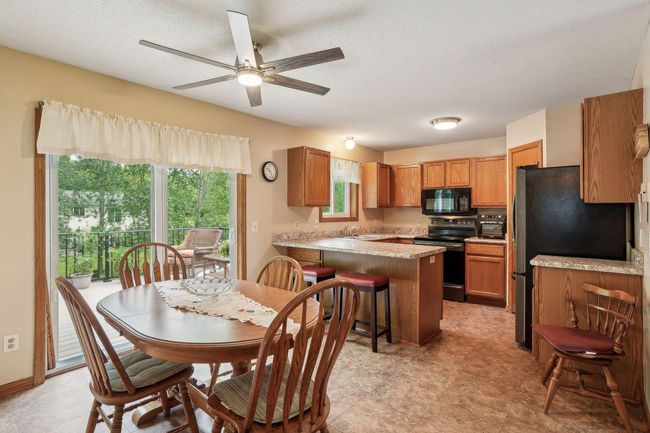 Spacious kitchen with an abundance of cabinetry. | Image 16