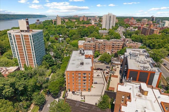 View of urban area featuring a large body of water | Image 26