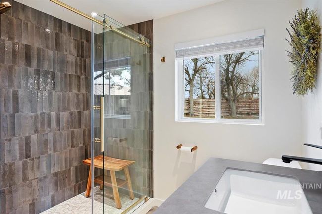 Full bath with tiled shower and a sink | Image 43