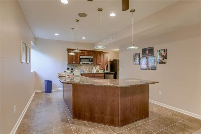 Full Kitchen in LL features a Kegerator and Island! Perfect for entertaining | Image 8