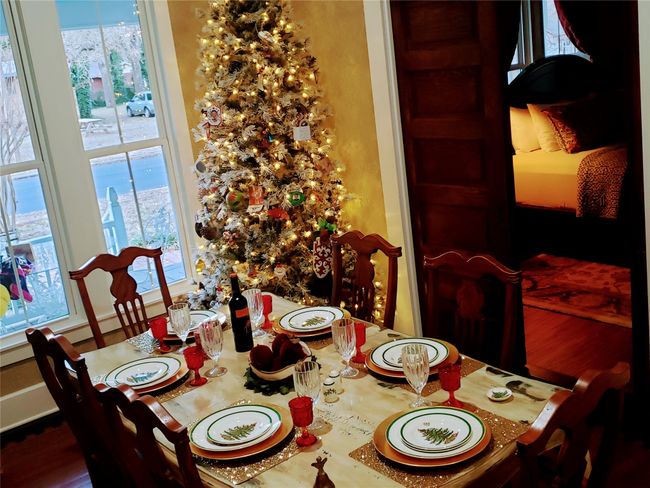 Dining table in Lobby utilized for holidays and guest rentring entire hotel for private gatherings such as graduation and reunions | Image 16