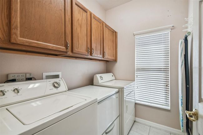 LAUNDRY ROOM W/STORAGE CABINETS | Image 59