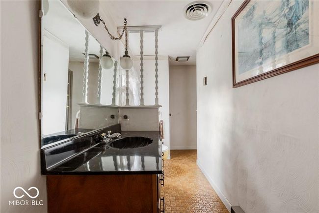 kitchen featuring dark countertops and brick patterned floors | Image 31