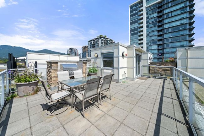 View of patio featuring outdoor dining space and a mountain view | Image 27
