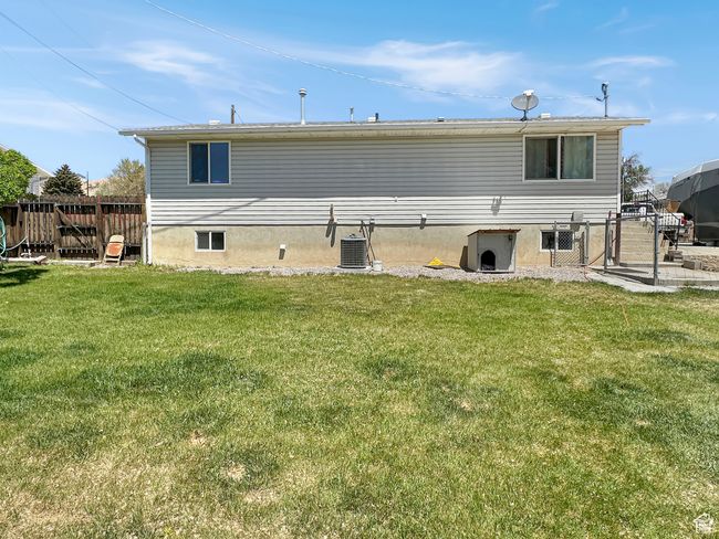 Back of house with central AC | Image 32