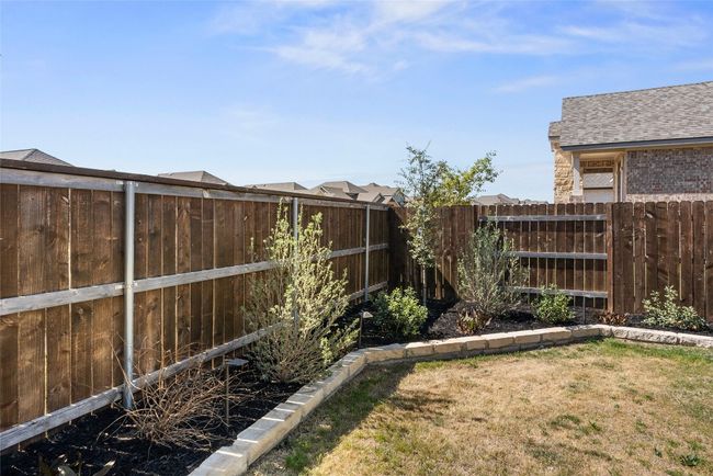 View of yard featuring a fenced backyard | Image 36