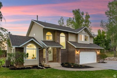 View of the front with mature shade trees, lilac bushes | Image 2