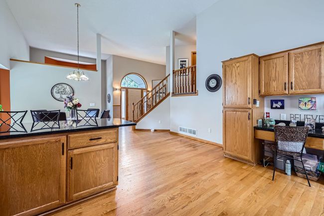 The kitchen offers granite counters and a new microwave! | Image 10
