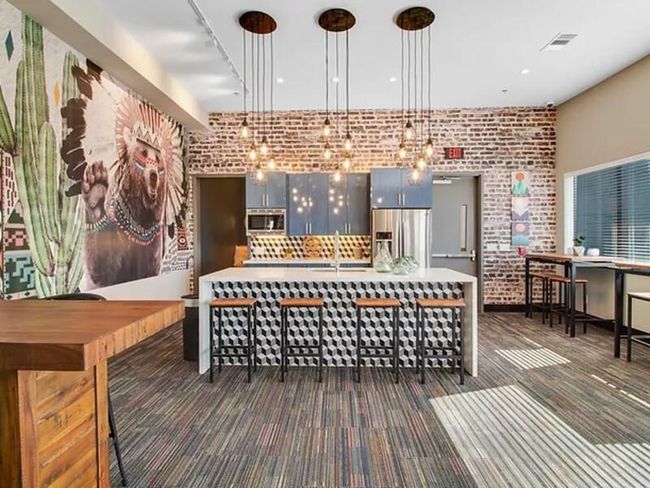 Reception featuring a sink and visible vents | Image 12