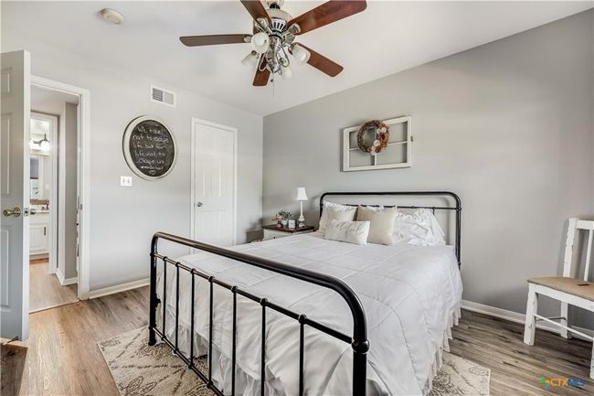 Main level bedroom with walk in closet | Image 19