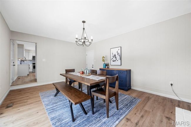 Just off the kitchen is a large Bonus Room. | Image 14