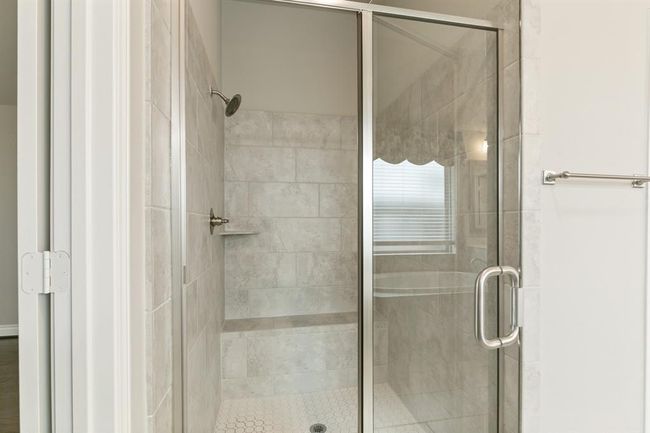 Primary Bath has Separate Stand Alone Shower with Bench. | Image 18